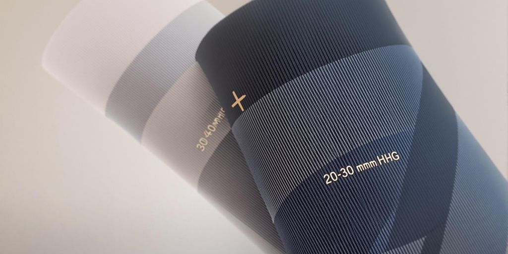 Meia de compressão 20-30 mmHg e 30-40 mmHg.