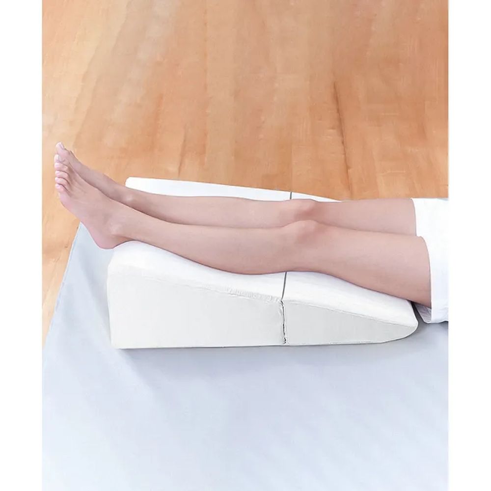 6979294e2194e8b0ef8eaade441124f8-1.jpg 6979294e2194e8b0ef8eaade441124f8 1 Almofada Suporte para Elevacao de Pernas Cansadas - Perfetto